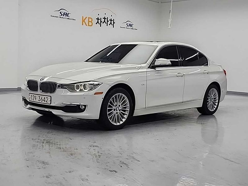 2012 BMW 3 Series 320d Luxury photo 1