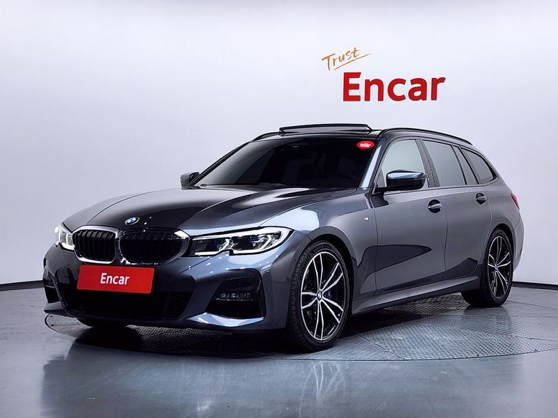 2022 BMW 3 Series 320d Touring M Sport photo 1